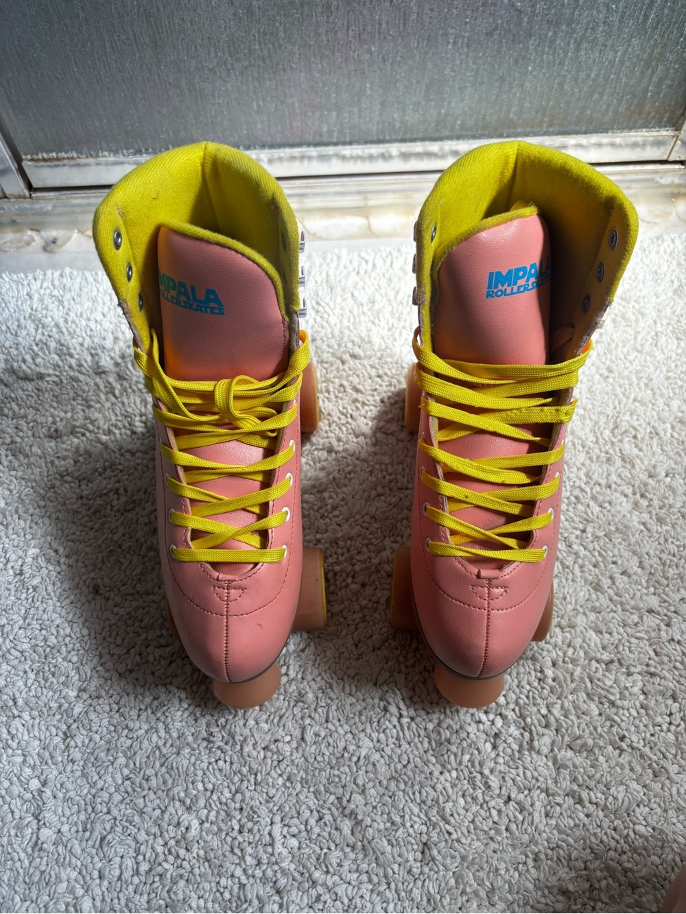 Impala Pink Roller Skates with Yellow Trim